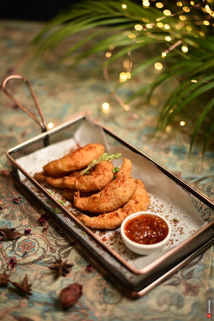 Crispy fried snacks with dipping sauce